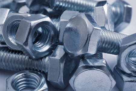 Macro of heap of bolts and nuts.の写真素材