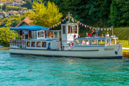 Maria Worth, Austria - August 14 2016: Vintage tourist boat Lorelei at pier waiting for tourists to board on nostalgic boat ride on Wortherseeのeditorial素材