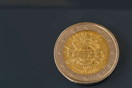 Commemorative 2 EUR coin issued to celebrate the 10th anniversary of Euro as currency, coin issued by Sloveniaの写真素材
