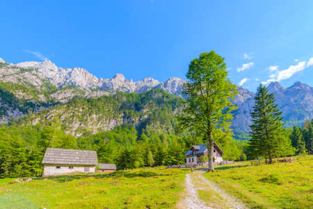 Mountain cabin, hut in European Alps, located in Robanov kot, Slovenia, popular hiking and climbing place with picturescue viewの写真素材