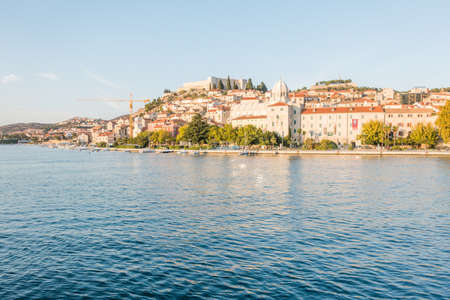 Old town of Sibenik, Croatia. Waterfront view from the seaの写真素材
