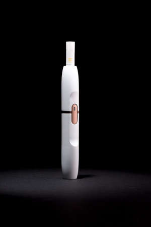 Newest electronic cigarettes, heating tobacco system IQOSの写真素材