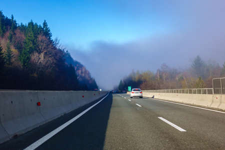Traffic on Slovenian highway A1 between Maribor and Ljubljana, trucks, cars and vansの写真素材