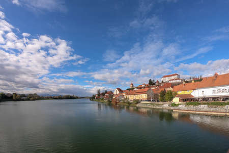 Ptuj, oldest town in Slovenia, ancient medieval castle overlooking houses and river, tourism and travel in Europeの写真素材