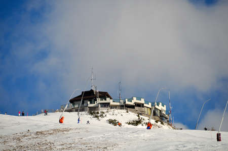 Krvavec Alpine Mountain Ski Resort in Slovenia, hotel on mountain peak on ski pisteの写真素材