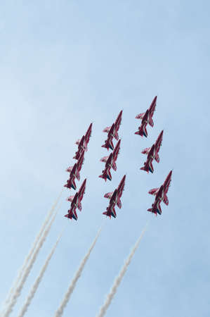 Maribor, Slovenia - June 3 2011: Red Arrows Aerobatic Display Team performing at public airshow in Maribor. The Red Arrows are the official display team of Royal Air Force. Free admittance to show.のeditorial素材