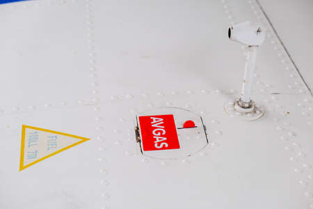 Pitot probe on top of light aircraft wing, close up detail with fuel tank latchの写真素材
