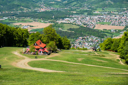 Maribor, Slovenia - 02 May 2019: Mountain hut Luka on the ski slopes of Pohorje with Maribor offers rest and refreshments to hikers and skiers while offering a magnificent view on Maribor, Sloveniaのeditorial素材