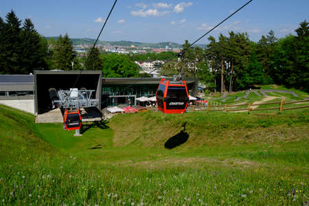 Maribor, Slovenia - May 2, 2019: Pohorska vzpenjaca cable car at lower station in Maribor, Slovenia, a popular destination for hiking and downhill mountain bikingのeditorial素材