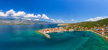 Old coastal town in Croatia, aerial view of Vinjerac near Zadar and Paklenica National park in the Velebit mountainsの写真素材