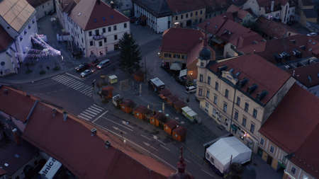 Slovenska Bistrica, Slovenia - Dec 25 2019: Closed shops on Christmas day on main square fair in Slovenska Bistrica, SLovenia, aerial viewのeditorial素材