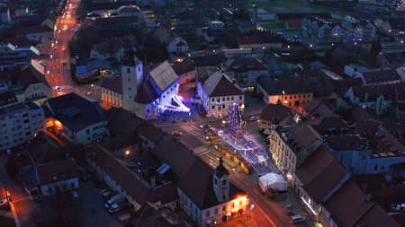 Aerial view of Christmas fair on main square in Slovenska Bistrica, a small medieval town in Slovenia, shops closed on Xmas eveの写真素材