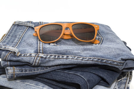 Close up image of denim jeans pocket with a ripped holeの写真素材