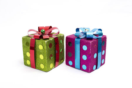 Bright coloured present boxes isolated on a white background
