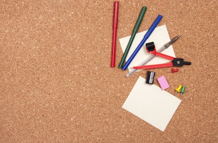 Stationary set and note on a cork boardの写真素材