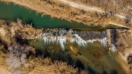 flow of the Segura River in Murcia with vegetationの写真素材