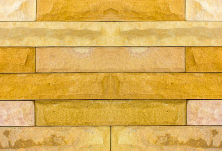 Pattern background of stone wall made with blocks.の写真素材