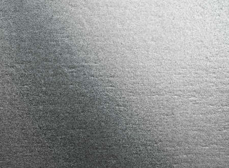 abstract background. shiny gray of silver foil texture