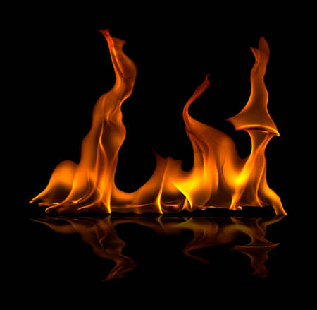 fire flame with sparks on a black backgroundの写真素材
