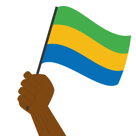 Hand holding and raising the national flag of Gabonのイラスト素材