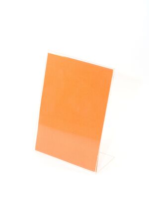 Paper holder with orange paperの写真素材