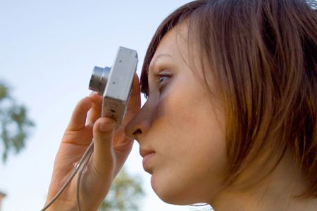 Woman with photocamera