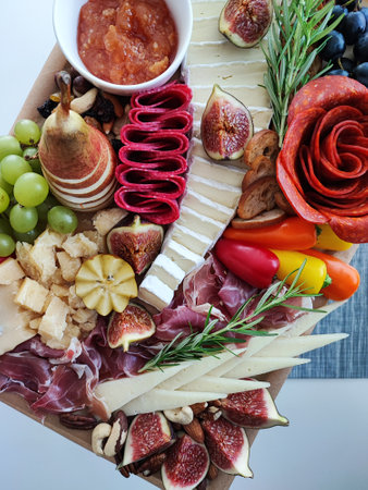 Charcuterie board, meat platter with prosciutto, cheese and figsの写真素材