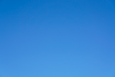 Clear blue sky only no cloud and sunshine background.の写真素材