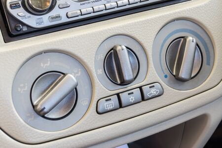 Air conditioning buttons of a carの写真素材