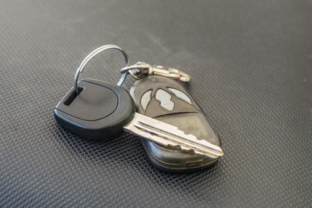 Car Keys and remote on Leather seats.の写真素材