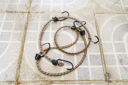 Rope laid on the concrete floorの写真素材