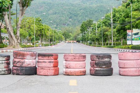 CHIANG MAI, THAILAND - JUNE 17:   Old used rubbish tires lies  on Raceway (Temporary street ) , JUNE 17, 2015 in Chiang Mai, Thailand.のeditorial素材