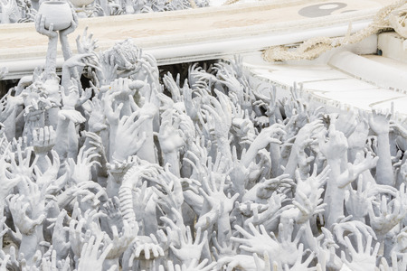 Abstract hands statue from Hell in Wat Rong Khun at Chiang Rai of Thailand