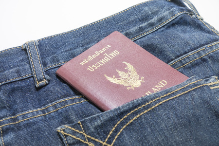 a Thailand passport in pocket of jeansの写真素材