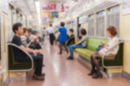 Blurred abstract background of people on subway trainの写真素材