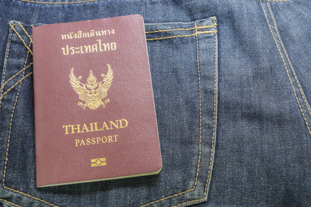 a Thailand passport in pocket of jeansの写真素材