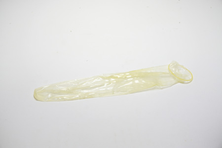 condom on white background, in contraception concept.Space for textの写真素材