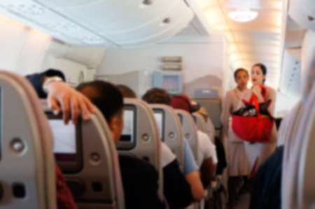 Blurred background of  interior aircraft , luggage cabin .の写真素材