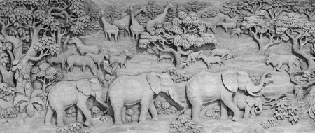 Carved Thai elephant on the wood frame in black and white.の写真素材