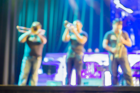 blurred background of night bokeh light,abstract texture background concert light background illumination,Blurred stage lights a rock concert,Stage spotlights,vintage colorの写真素材