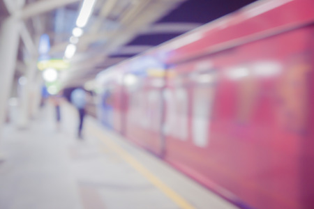 Abstract blur or defocus Background of People waiting for Boarding Skytrain or Monorail train or MRT,Blurred city people lifestyle backgroundの写真素材