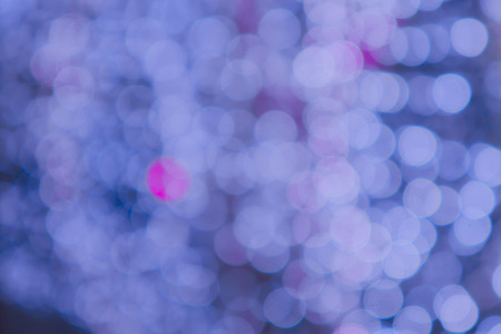 Abstract circular bokeh background of Christmas light,Blue Festive Christmas elegant abstract background with bokeh lights and starsの写真素材