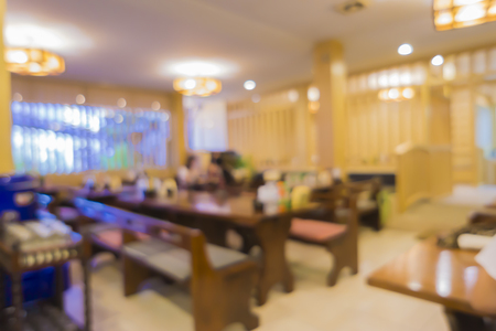 Abstract Blurred background image of japan restaurant blur background with bokeh,tables of oriental style interior of the asian, japanese restaurant.の写真素材
