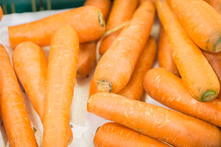 Fresh carrots at the local market,fresh carrots and parsley in the market,resh carrot bunch on...