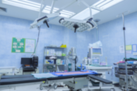 Blur of equipment and medical devices in modern operating room take with art lighting and blue filter,ready for operation,interior of the operating room with the anesthesiology machineの写真素材