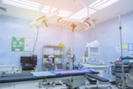 Blur of equipment and medical devices in modern operating room take with art lighting and blue filter,ready for operation,interior of the operating room with the anesthesiology machineの写真素材