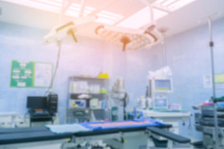 Blur of equipment and medical devices in modern operating room take with art lighting and blue filter,ready for operation,interior of the operating room with the anesthesiology machineの写真素材