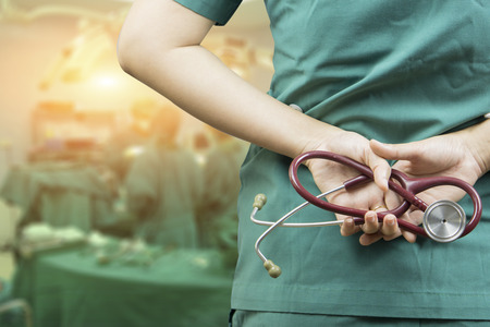 Doctor with stethoscope in a hospital,women doctor standing,medical students during the conference,Health Check system support for patient,test results and patient registration,medical,selective focusの写真素材
