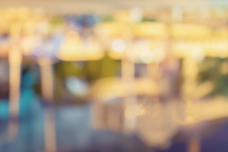 blured of bokeh abstract of resturant night light background,vintage colorの写真素材