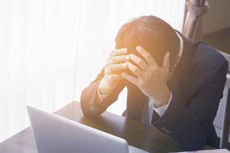 Finance & Business.Office,technology,internet, business,Exhausted businessman falling a sleep at his office desk,entrepreneur, trader, tycoon, operator,sad Frustrated stressed  ,vintage colorの写真素材